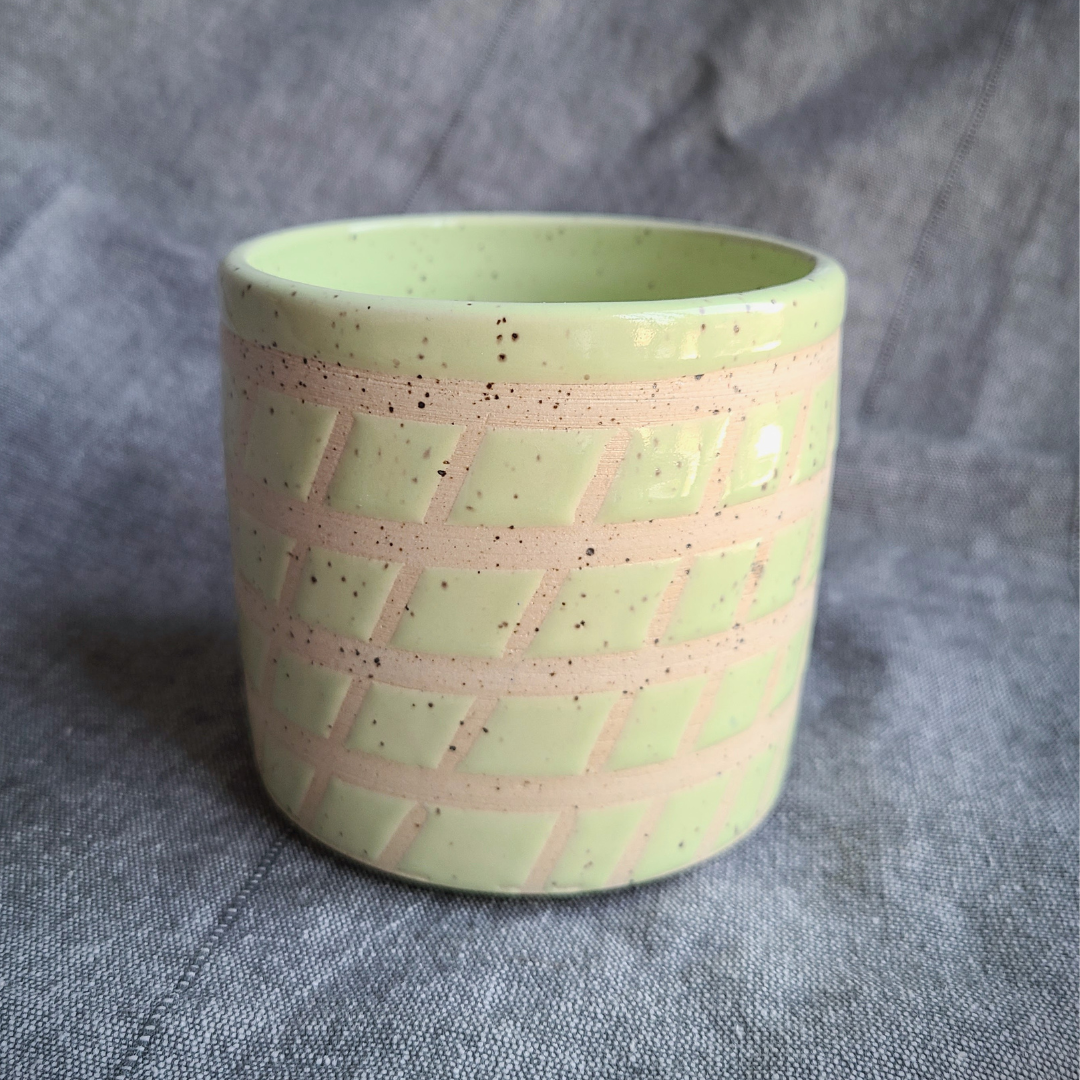 Green tiled cup